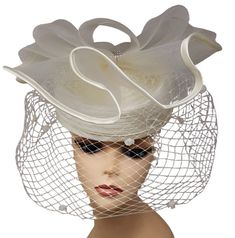 Lady Diane Brand Veiled Fascinator Style: 20231014 Color shown: White Chic Fitted Fascinator For Party, Chic Adjustable Fascinator For Party, Fitted Costume Hats And Headpieces For Spring Party, Chic Costume Hats For Royal Ascot Party, Chic Fitted Headpieces For Party, Chic Fitted Party Headpiece, Chic Evening Hats For Spring, Chic Spring Evening Hats, Chic Fascinator For Kentucky Derby Party