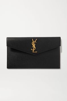 SAINT LAURENT's 'Uptown' pouch fits everything you need for an evening at a gallery opening or rooftop bar. It's been made in Italy from textured-leather and decorated with the iconic 'YSL' hardware in gold. Carry it in hand or slip it inside one of the brand's bags. Saint Laurent Jeans, Black Leather Clutch, Saint Laurent Bags, Popular Bags, Accessory Pouch, Saint Laurent Bag, Branded Bags, Leather Pouch, Leather Clutch