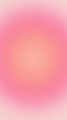 a pink and green blurry background with an oval shape