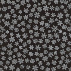 black and white snowflakes on a dark background