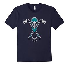 a t - shirt with two crossed hockey sticks and an ice hockey goalie helmet on it