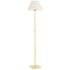 a floor lamp with a white shade on the base and a gold metal pole,