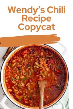 the cover of wendy's chili recipe copycat with a wooden spoon in it