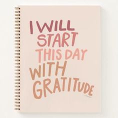 a spiral notebook with the words i will start this day with gratitude