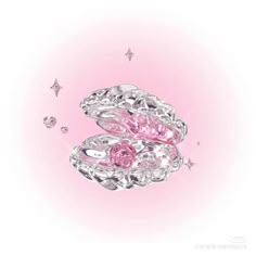 two pink diamond rings on top of each other