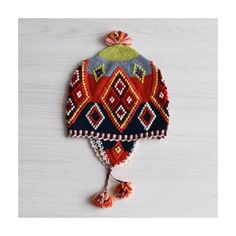 Peruvian hat, chullo with embroidered details, handmade woolen hat. Colorful chullo hat handmade in the south of Peru by women. Article number: 22-4203-05 Color: multi Material : 100% sheep wool Dimensions: Width 24 cm / 9.5 inch Weight: 0.15 lbs / 0.07 kg Price including shipping. World wide delivery Bohemian Hand Knitted Hat One Size, Bohemian Hand Knitted Hat, Bohemian Winter Hats, Warm Adjustable Bohemian Crochet Hat, Handmade Winter Hats One Size, Handmade Wool Hats One Size Fits Most, Handmade Winter Hats, Traditional Beanie Hats For Winter, Handmade Wool Hat One Size