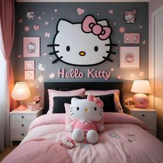 a hello kitty bedroom with pink bedding and decorations on the wall above the bed