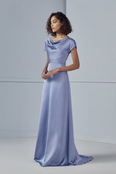 A combination of cowl neckline and cap sleeves makes this bridesmaids style unique, and the back shows a hint of skin with a shallow V. A fluid satin A-line skirt completes the look. Shown in Slate. Cream Color Bridesmaid Dresses, Cowl Neckline Dress, Princess Clothing, Amsale Bridesmaid, Amsale Dress, Bridesmaid Dresses Satin, Casual Frocks, Bridesmaid Dresses With Sleeves, Modest Bridesmaid Dresses