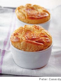 two small pies sitting on top of a white cloth