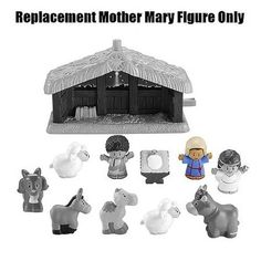 an assortment of toy figurines including horses, sheeps and a man in a straw hut