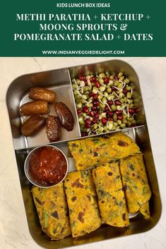 a metal tray filled with different types of food