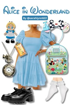 a woman in a blue dress and some accessories