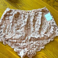 Gorgeous Lace Shorts. Pink Color. Has Lining. Waist - 12” But It Does Have A Elastic Band That Stretches More. Feminine Lace Lounge Bottoms, Spring Lace Brief Bottoms, Lace Bottoms For Summer Loungewear, Lace Loungewear Shorts, Feminine Bottoms With Lace Trim For Vacation, Feminine Lace Trim Bottoms For Vacation, Spring Lace Shorts For Loungewear, Casual Pink Lace Bottoms, Lace Pajama Shorts For Summer