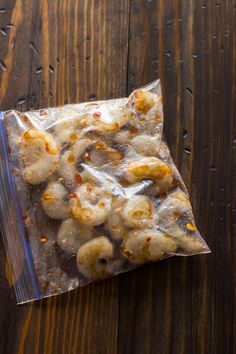 a bag of food sitting on top of a wooden table