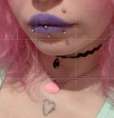 a woman with pink hair and piercings on her face is shown in four squares