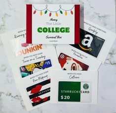 several different business cards on top of each other with the college logo and name printed on them