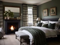 a bedroom with a bed, chair and fireplace in it