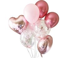 a bunch of pink and gold balloons in the shape of heart - shaped balloons on a white background