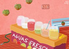 there are many jars on the counter with fruit and drinks in front of them that say aguas fresca