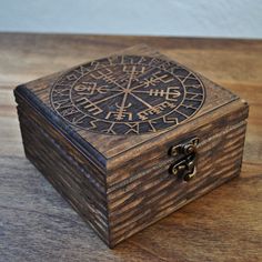 a wooden box sitting on top of a table