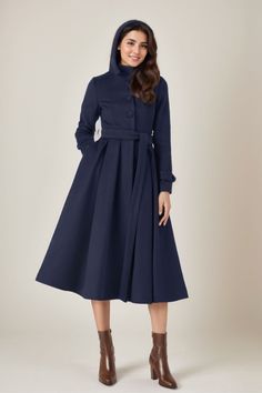 FEATURES 50% wool, 50% wool blend Fully liner with polyester Two pockets Hooeded neckline Long sleeve Button closure in front Belt waist Navy wool coat Long wool coat For Winter, Autumn dry clean ★★Mode size Height 170cm (5′ 7″)  Bust 84 cm (33")  Waist 66 cm (26")  She wears size XS. ★★Bespoke Order Service If you Request other color Request the length Your height is not between 155 cm- 175 cm Your weight is not between 47 kg -77 kg I can do it for you, It will need some extra fee depending on on your need. Contact with me for more detail. ★★ Warmly Note: 1 ) : Please confirm your shipping address! If you wish to ship the item to a different address, please send me a message immediately after purchase. We can't change it after shipping, thank you for your understanding. 2 ) : Due to indiv Navy Wool Coat, Coat For Winter, Hooded Wool Coat, Wool Winter Coat, Long Wool Coat, Coat Winter, Fitted Bodice, Coat Dress, Long Coat