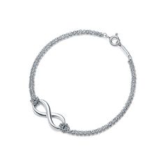 Tiffany Infinity is a powerful symbol of continuous connection, energy and vitality. The addition of endlessly looped double chains echoes the infinite nature of the design. Sterling silver; Small, 6" long | Tiffany infinity Bracelet in Sterling Silver, Small Bridal Jewelry Bracelets, 480x800 Wallpaper, Tiffany And Co Bracelet, Tiffany Bracelets, 2023 Mood, Bracelets Charm, Stackable Bangles, Presents For Women, Fairytale Fantasy