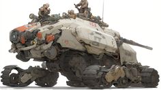 some soldiers are riding on top of an armored vehicle that is shaped like a tank