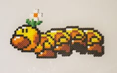 a piece of art made to look like a lego train with carrots on it