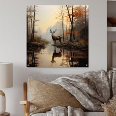 a painting of a deer and its reflection in the water on a wall above a couch