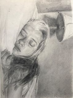 a pencil drawing of a woman with her eyes closed and head tilted to the side