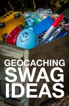 a metal box filled with assorted items and the words geocaching swag ideas