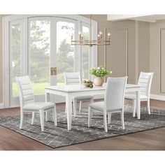 Elevate your dining space with the Mayberry Hill Diedra Side Chair, a paragon of modern elegance and comfort. This chair is designed to impress with its pristine white finish and luxurious diamond strip detailing.

- Material: High-quality materials for durability and comfort
- Color: Sleek white to complement any dining room decor
- Features: Horizontal channel design for a touch of sophistication

The Diedra Side Chair not only offers visual appeal but also provides a comfortable seating exper Hampton House, White Dining Table, White Dining Room, White Upholstery, Teen Bedroom Furniture, Door Hardware Interior, Chic Aesthetic, Nursery Furniture Sets, Bedroom Furniture For Sale