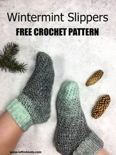 a person's feet with knitted slippers and pine cones