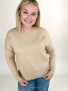 This cozy sweater, in a soft oatmeal, offers a timeless look that’s easy to dress up or down. Wear it alone for a simple, chic outfit, or layer it under a vest or flannel for added warmth and style. Available in small, medium, large, & extra large Color: Oatmeal Emily is 5'6" and has a 34c bust. She is wearing a medium. Runs true to size Ribbed round neckline Ribbed cuff and hem Paired here with our Megan Mid Rise Raw Hem Wide Leg Denim Simple Chic, Chic Outfit, Cozy Sweater, Wide Leg Denim, British Indian, Cozy Sweaters, Crewneck Sweater, Crew Neck Sweater, Round Neckline