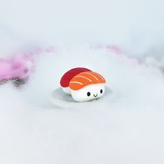 there is a sushi toy in the snow