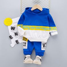 Playful Blue Sets For Fall, Casual Patchwork Sets For Winter, Blue Cotton Long Sleeve Tracksuit, Blue Hooded Sets For Spring, Blue Long Sleeve Cotton Tracksuit, Blue Cotton Patchwork Sets, Blue Hooded Spring Sets, White Long Sleeve Patchwork Sets, Sporty Cotton Color Block Sets