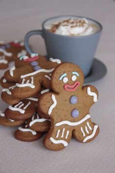 there are many ginger cookies and a cup of coffee