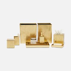 gold bathroom accessories set with soap dispenser, tissue and toothbrush holder