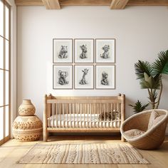 a baby's room with pictures on the wall