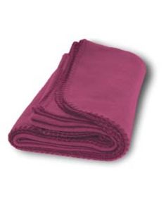 a stack of pink towels folded on top of each other