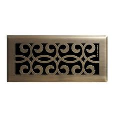 a metal register cover with an intricate design on the front and sides, in black and silver