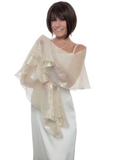 "This glamorous scarf is made for bridal or evening wear in a stunning gloss gold-on-cream color and is perfect for wedding ceremonies, evening parties and red carpet events. Made with finest quality fabric this wrap can be paired with the best designers dresses and gives a sense of glam luxury to your shoulders. Dimension: The full length of the scarf is about 66\" and the width on the central widest part is about 15\". Care Instructions: hand wash cool, hang up to dry, iron if needed. Before y Fitted Elegant Shawl For Festive Occasions, Elegant Fitted Festive Shawl, Elegant Sheer Dupatta For Wedding, Glamorous Celebration Dupatta, Elegant Festive Organza Dupatta, Elegant Cream Organza Dupatta, Elegant Organza Dupatta For Festive Occasions, Gold Fitted Shawl For Party, Fitted Gold Shawl For Party