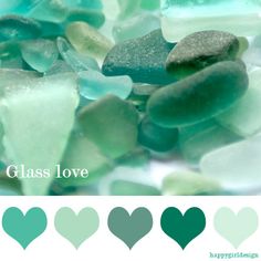 green and blue sea glass on the beach