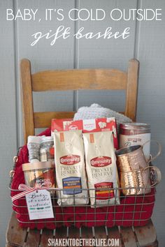 baby it's cold outside gift basket on a chair with coffee and other items