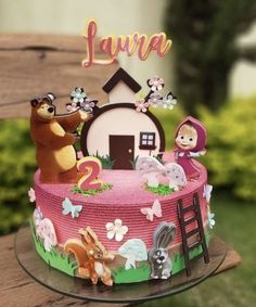 there is a cake that has animals on it