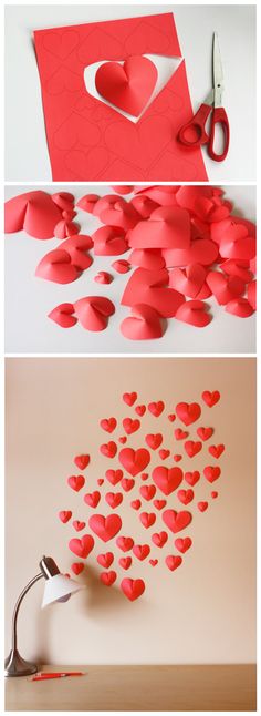 paper hearts are cut out and placed on the wall to make it look like they have been