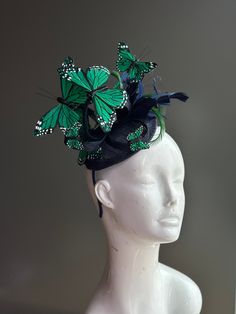 This elegant butterfly fascinator is decorated with green monarch butterflies and featured in a variety of colors on a black fascinator base and headband/clip option. You have the option to pick other colors listed or a mixed color option. The perfect holiday gift for the fashionable! Also available in other designs! I N C L U D E D Black fascinator on headband base topped with high-quality intricately detailed butterflies.  In secure box packaging to keep form.  S H I P P I N G -  Processed sam Whimsical Green Mini Hats For Parties, Black Headband For Spring Races, Green Spring Party Hair Accessories, Black Summer Headband For Races, Black Mini Hats For Kentucky Derby Garden Party, Black Headband For Summer Races, Fitted Black Headband For Spring, Black Mini Hats For Kentucky Derby, Spring Fitted Black Headband