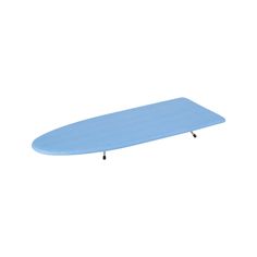 a blue surfboard sitting on top of a white wall