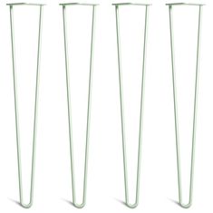 four tall green metal poles on a white background