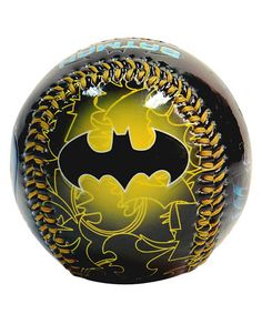 a baseball with the batman symbol painted on it's front and yellow stitching